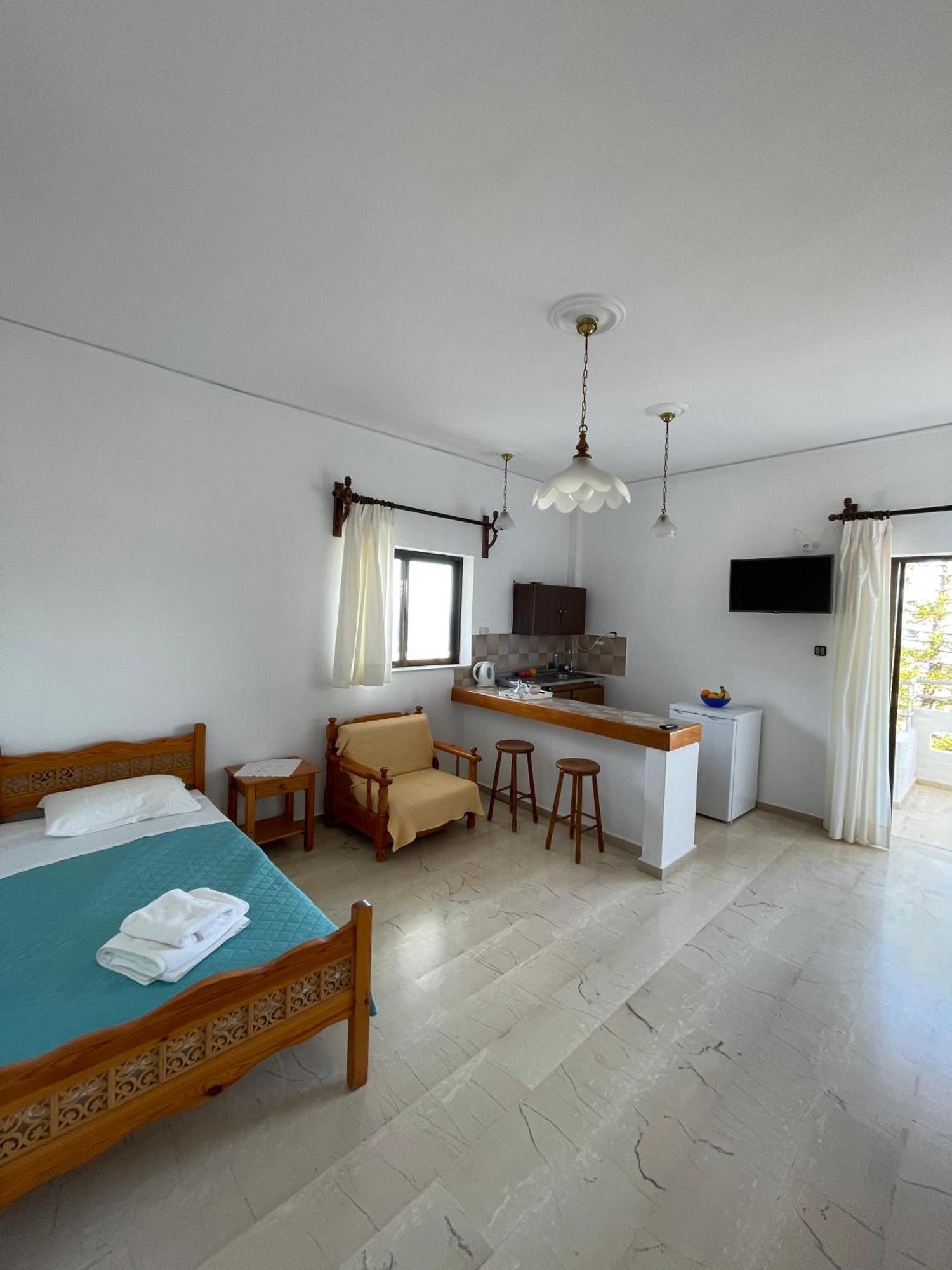 Aeolos Apartments Kolimvarion Bagian luar foto