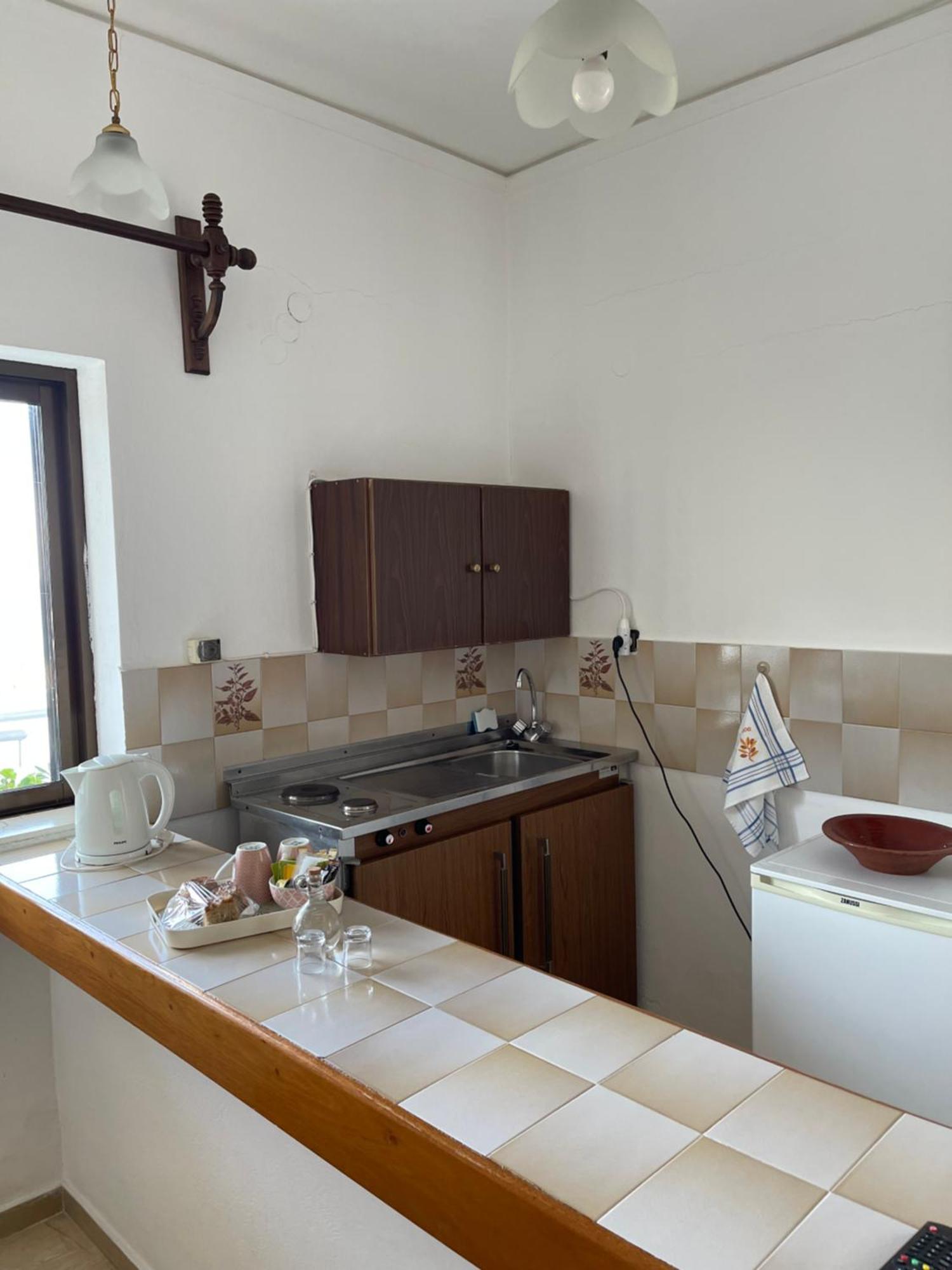 Aeolos Apartments Kolimvarion Bagian luar foto